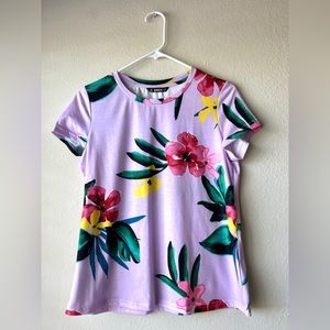 Hawaii woman’s purple T-shirt